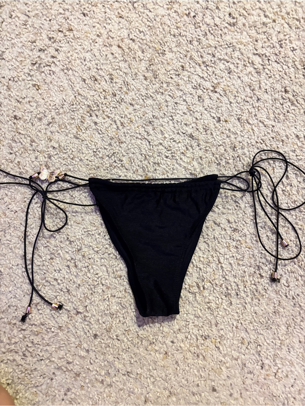Gold butterfly decal string bikini bottoms size M